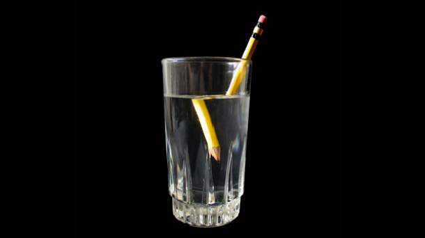 Pencil in glass of water