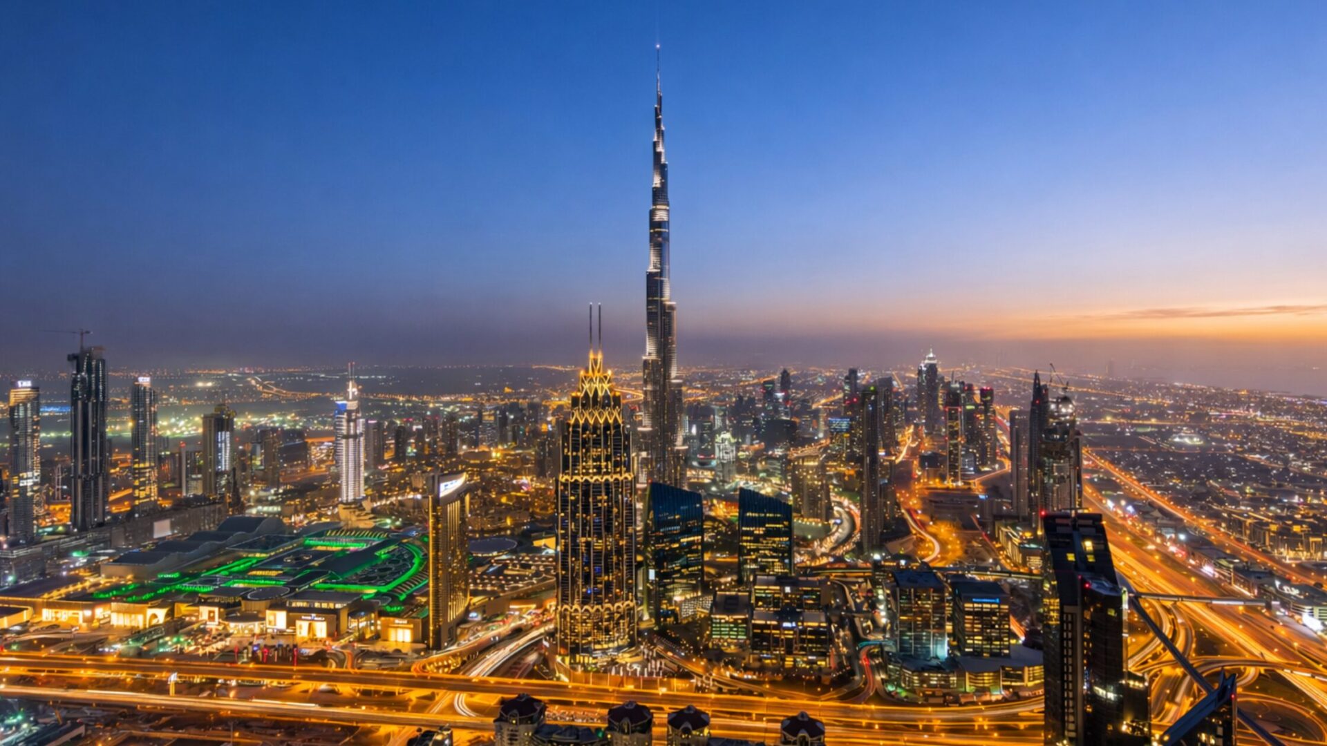 Long-exposure city skyline at night representing the accelerating pace of organisational and technological change